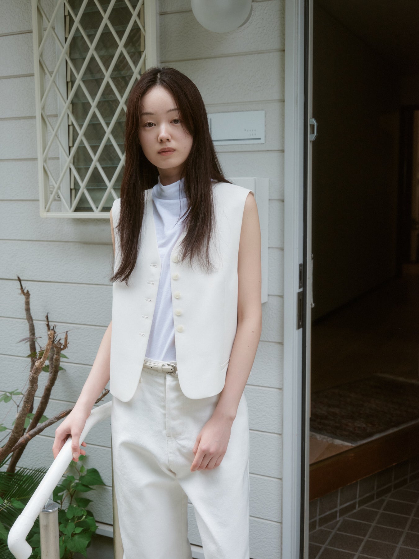 ボタンスリットベスト