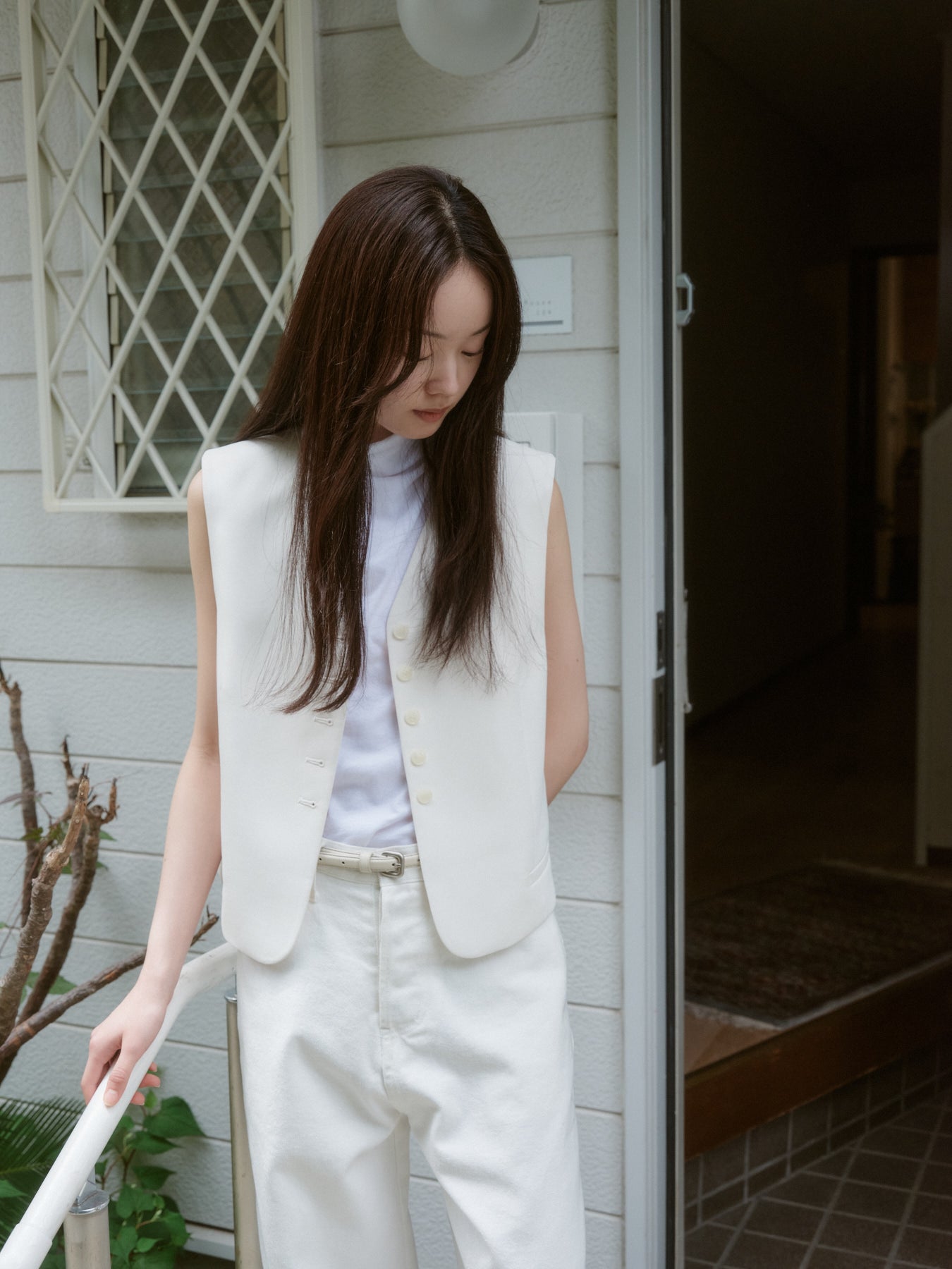 ボタンスリットベスト